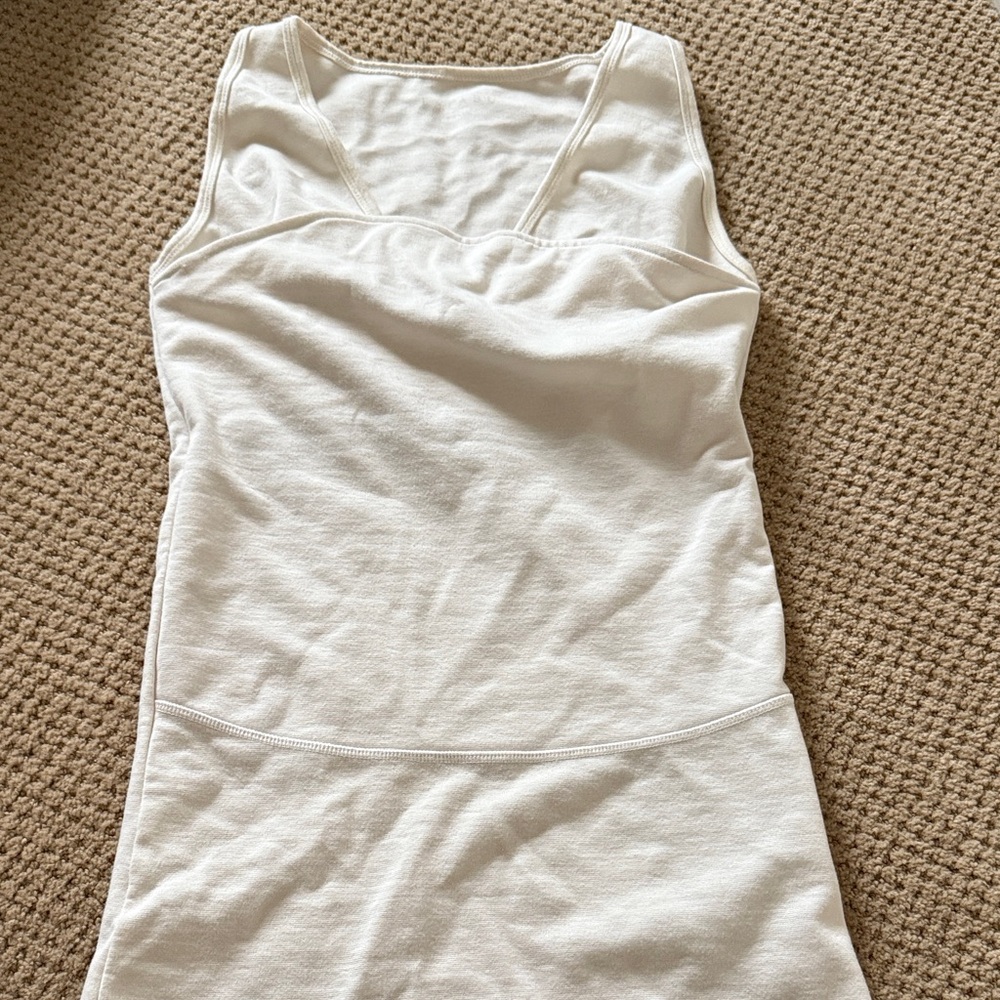 Lalabu baby wearing tank top